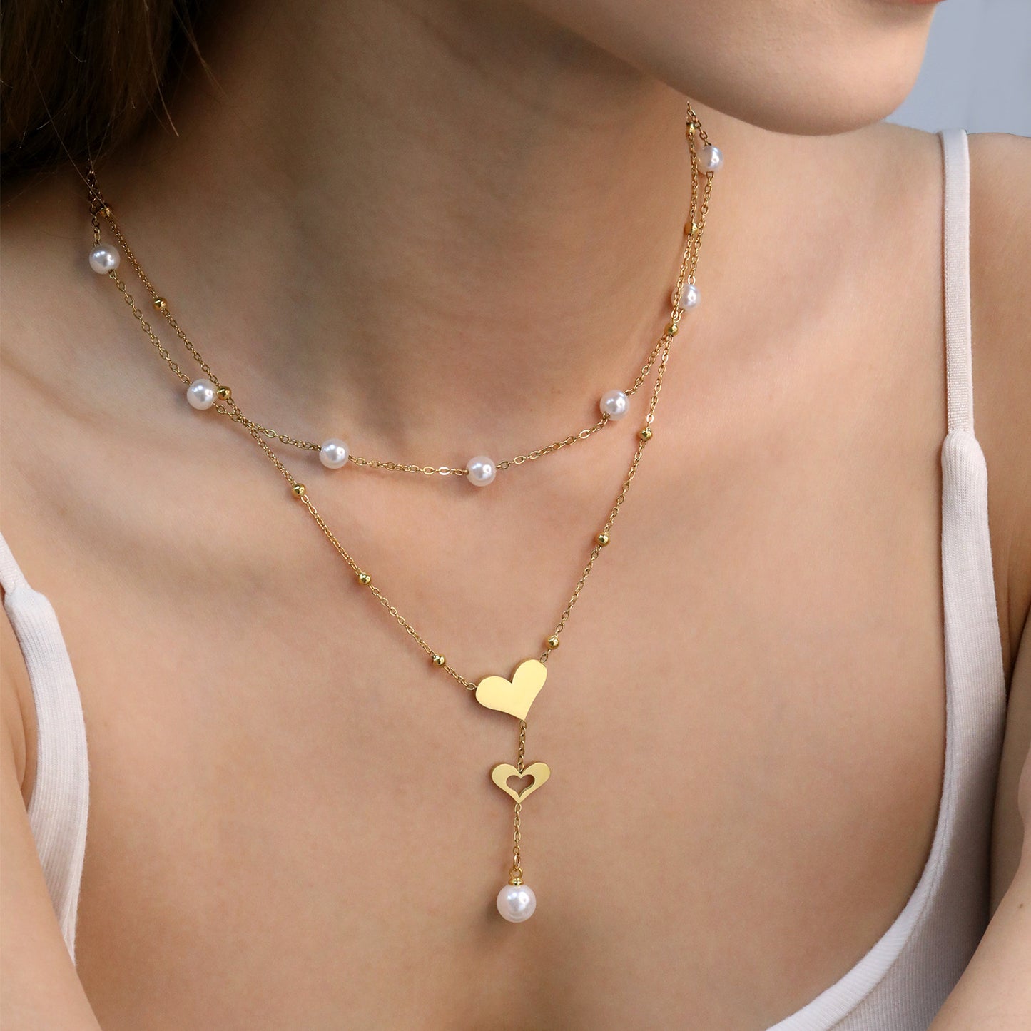 Wholesale Waterproof PVD Gold Sculpted Double Heart Pearl Tassel Necklace