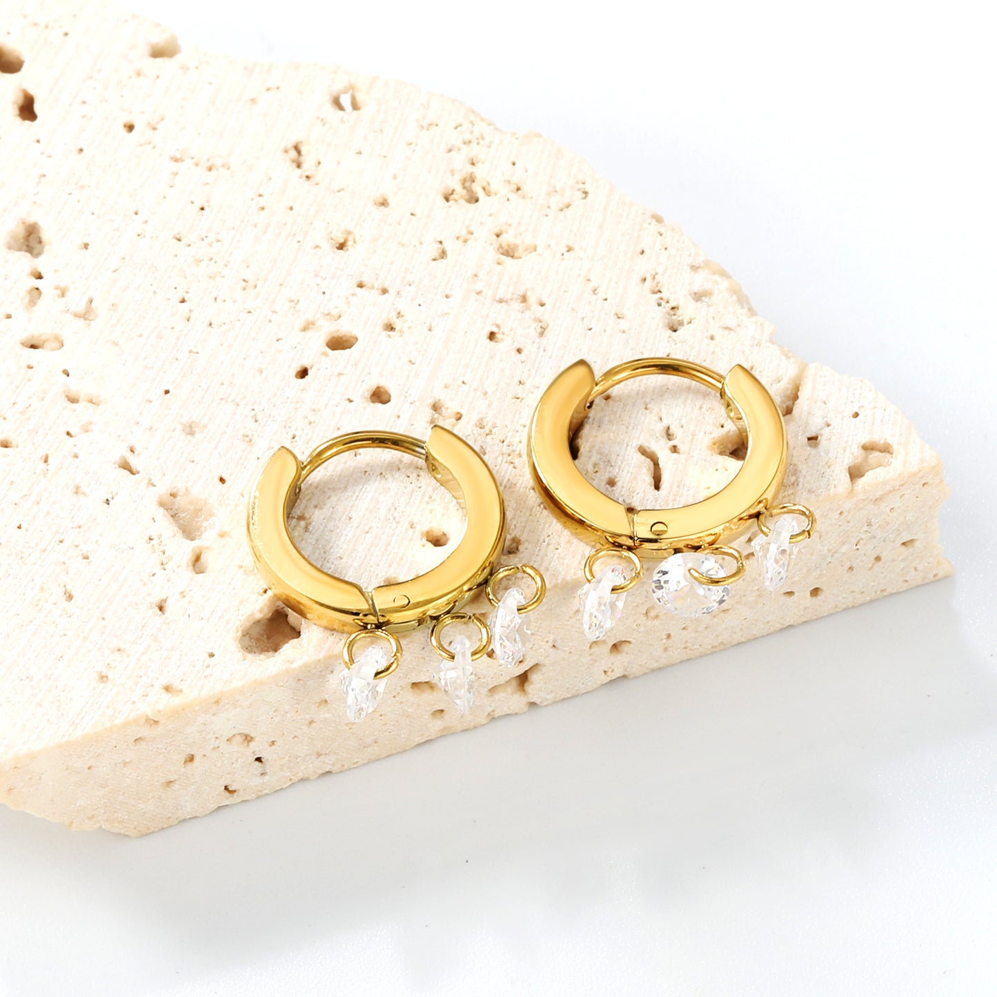 Golden spherical earrings + 3 round white zirconia earrings Jewelry Supplier