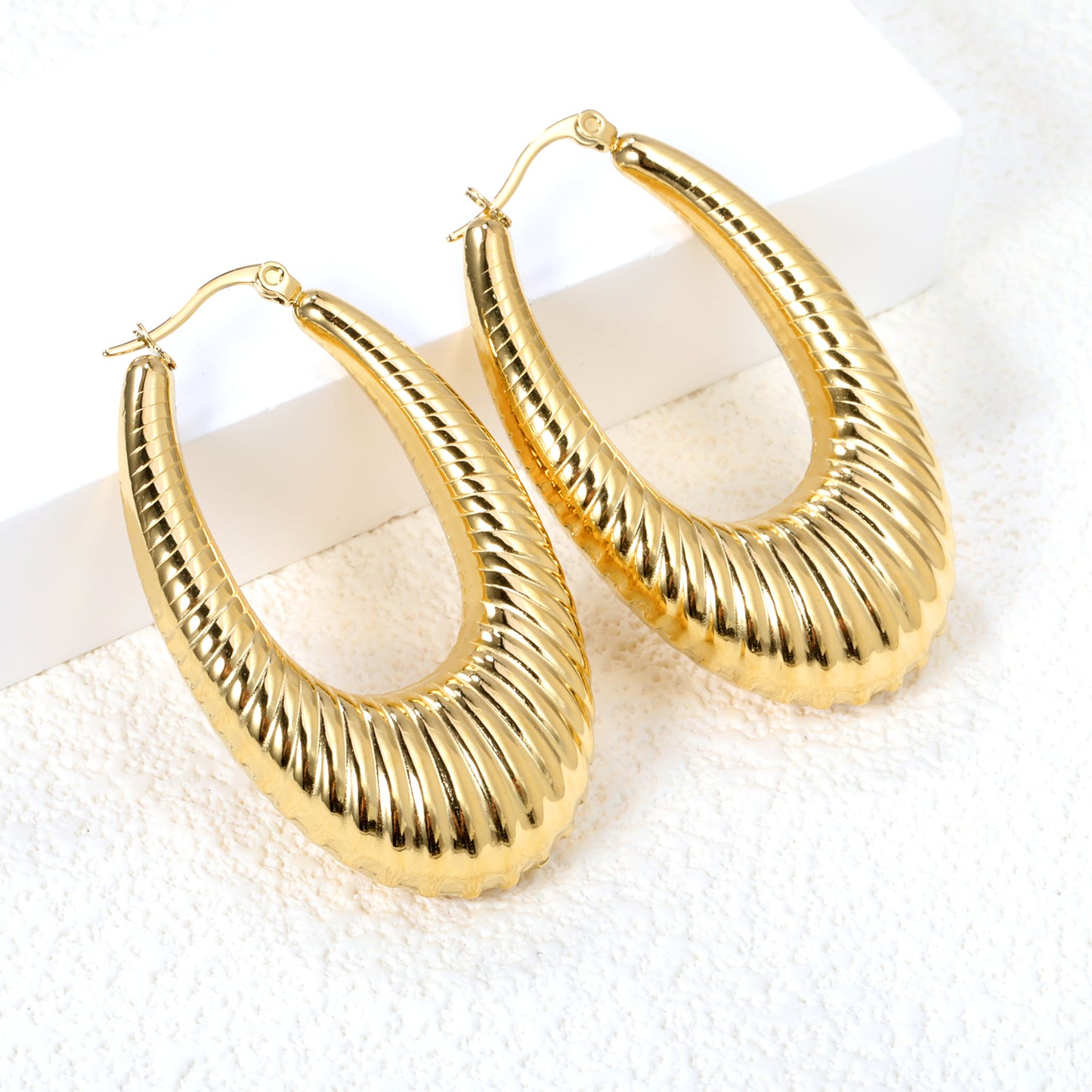 Wholesale Polished Curved Gold Hoop Earrings for Fashion Distributors