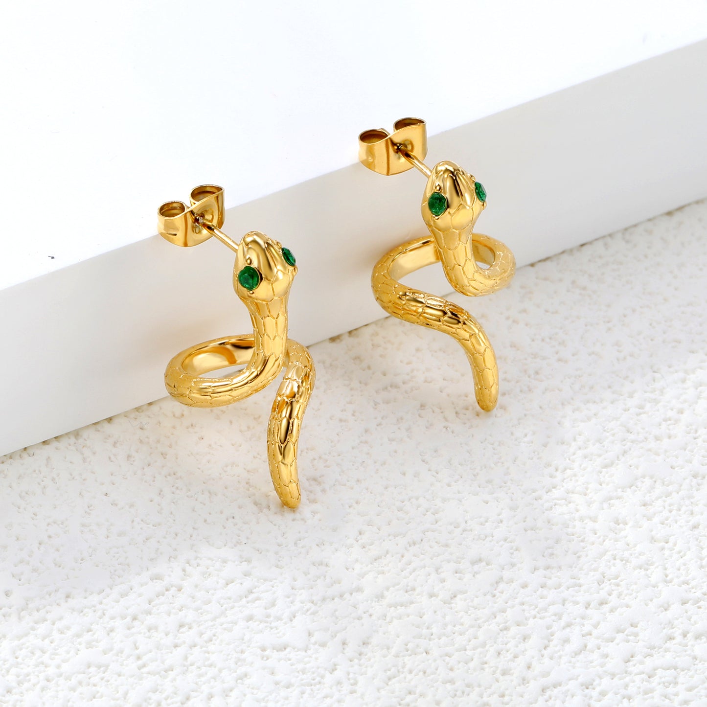 Gold snake with 2 green diamonds stud earrings jewelry supplier