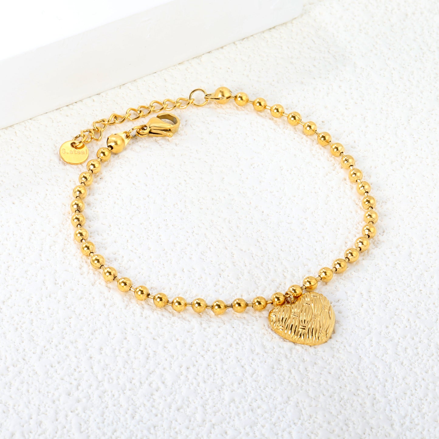 Stainless steel gold heart pattern bracelet jewelry supplier