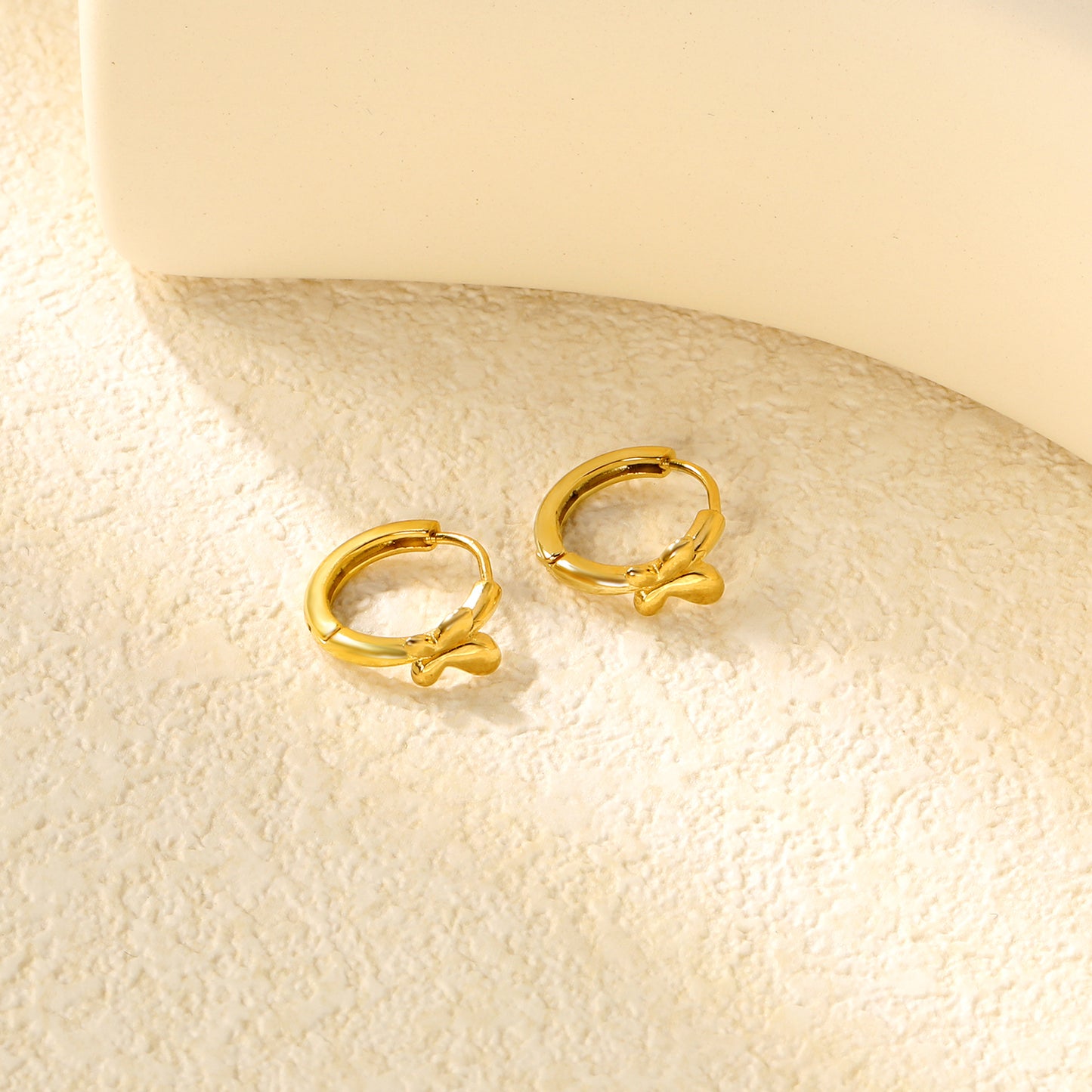 Wholesale Stainless Steel 18K Gold Plated 18K Gold Plated Glossy Butterfly EarringsClose-ups of the gold plating and details