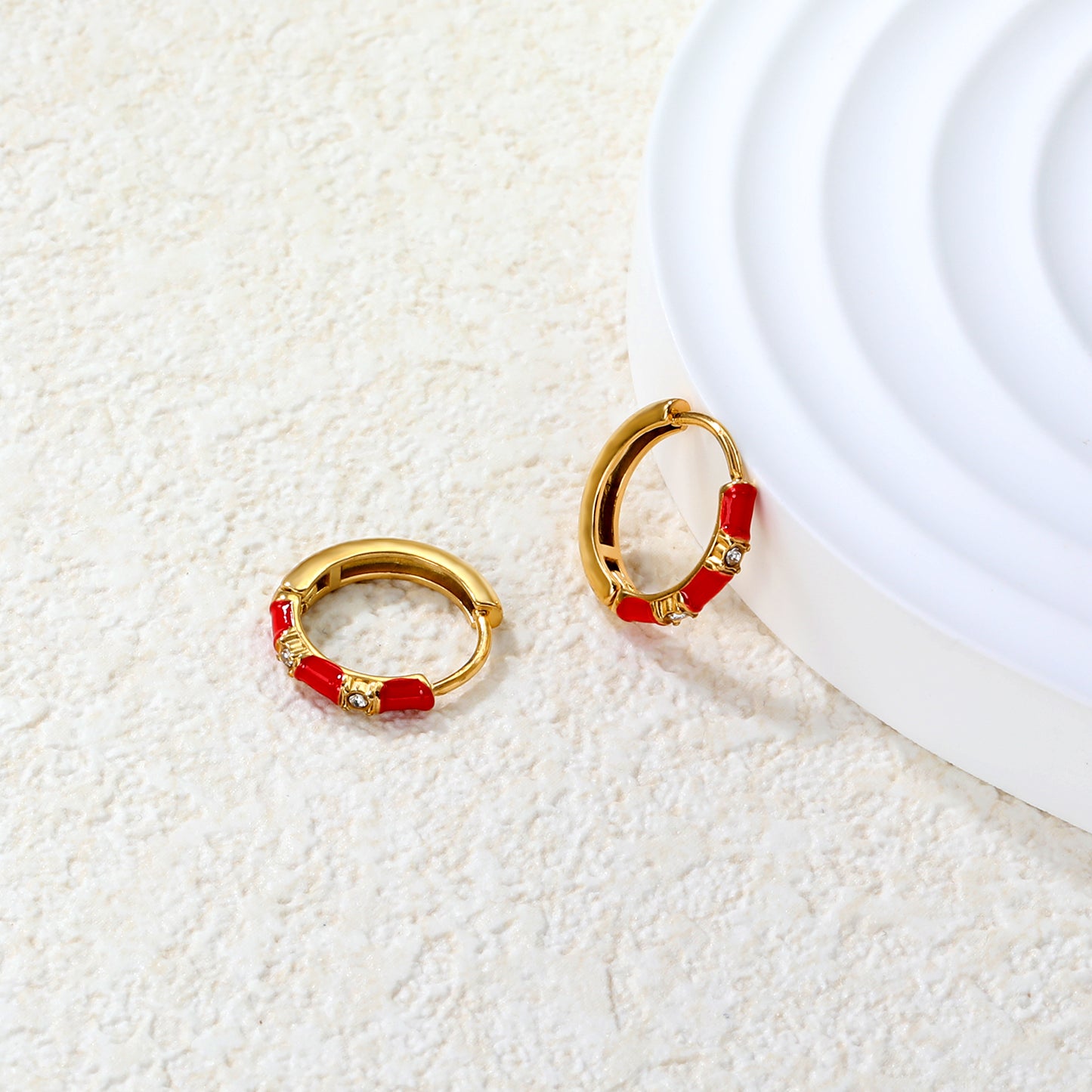 Wholesale Stainless Steel Bold Red Enamel & Diamond EarringsClose-ups of the gold plating and details