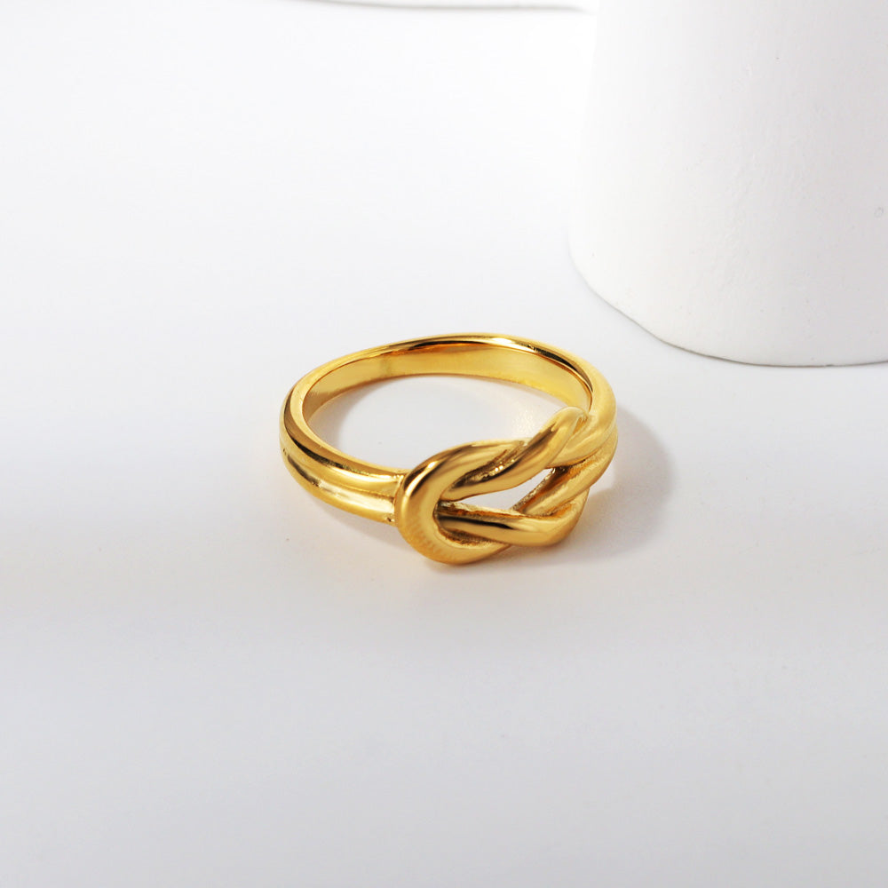 minimalist twisted ring styling light white environment jewelry inspiration