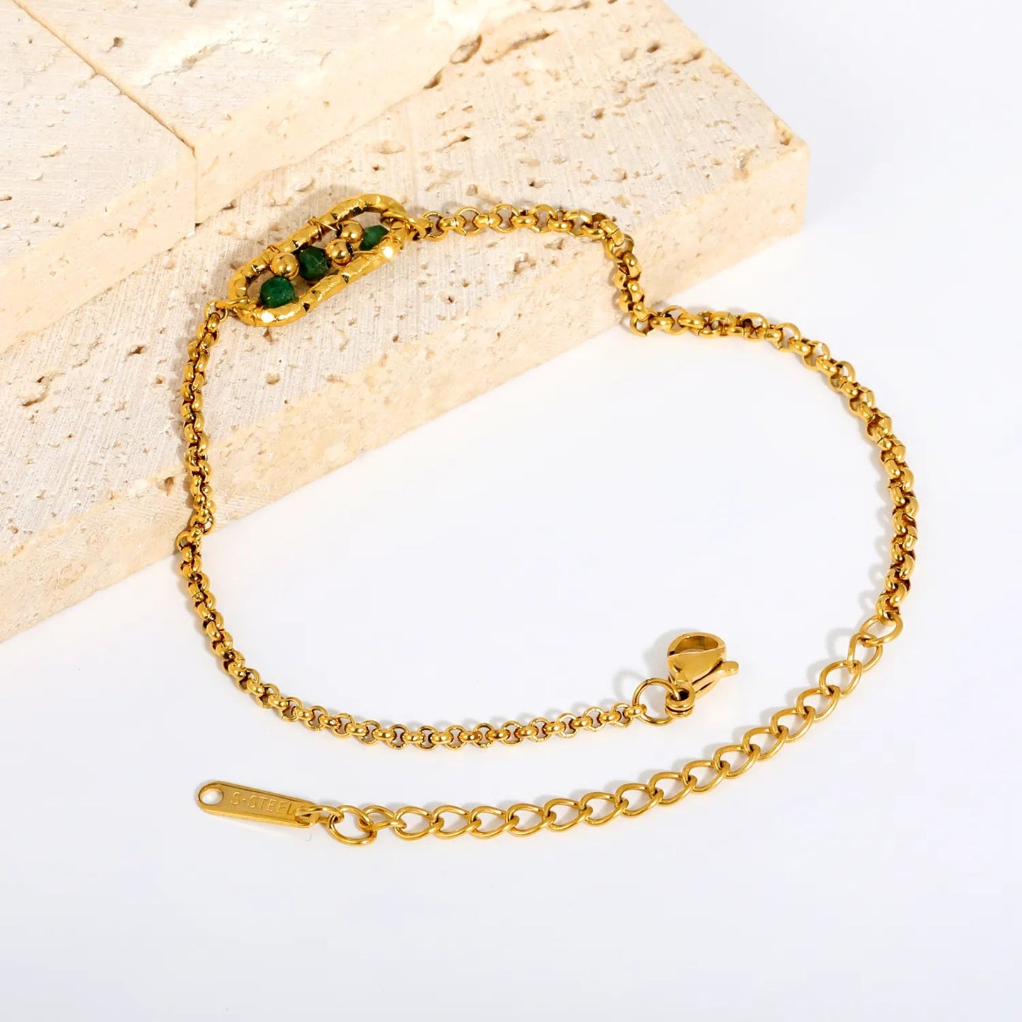Channel Vintage French Elegance with Rich Emerald Green Beads Encased in Gold