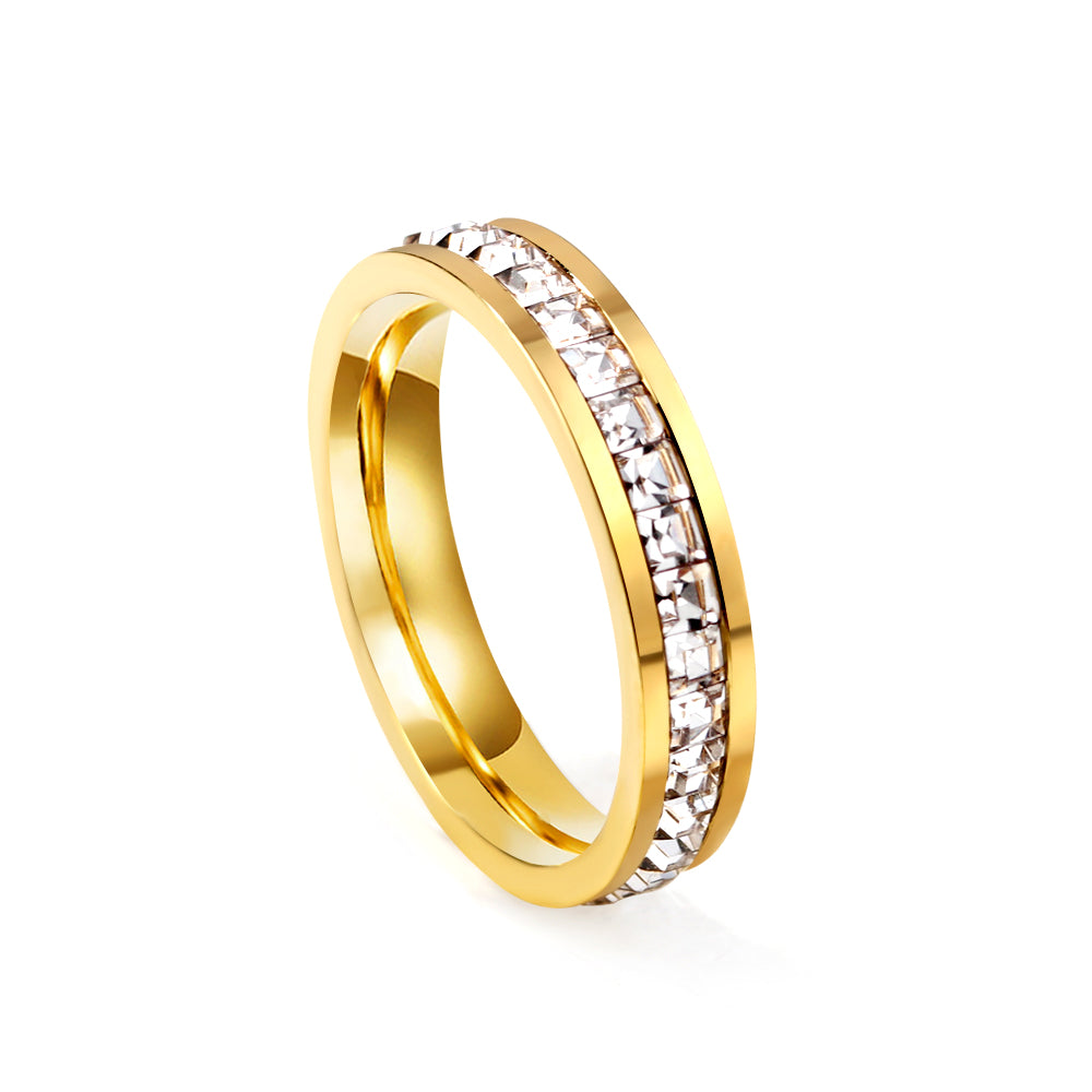 stainless steel gold cz stone ring aligned crystals white background wholesale