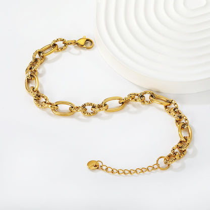 Wholesale Waterproof PVD Gold Sculpted Hollow Motif Oval Link Bracelet