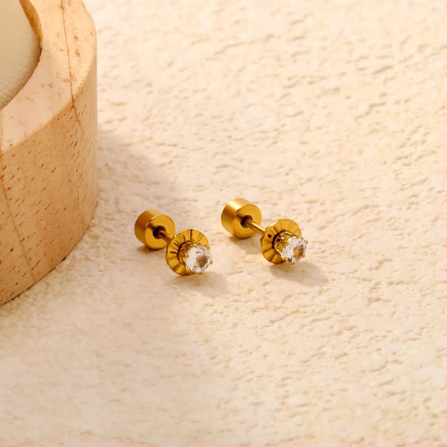 12 pairs of single-stone cubic zirconia flat-back stainless steel stud earrings