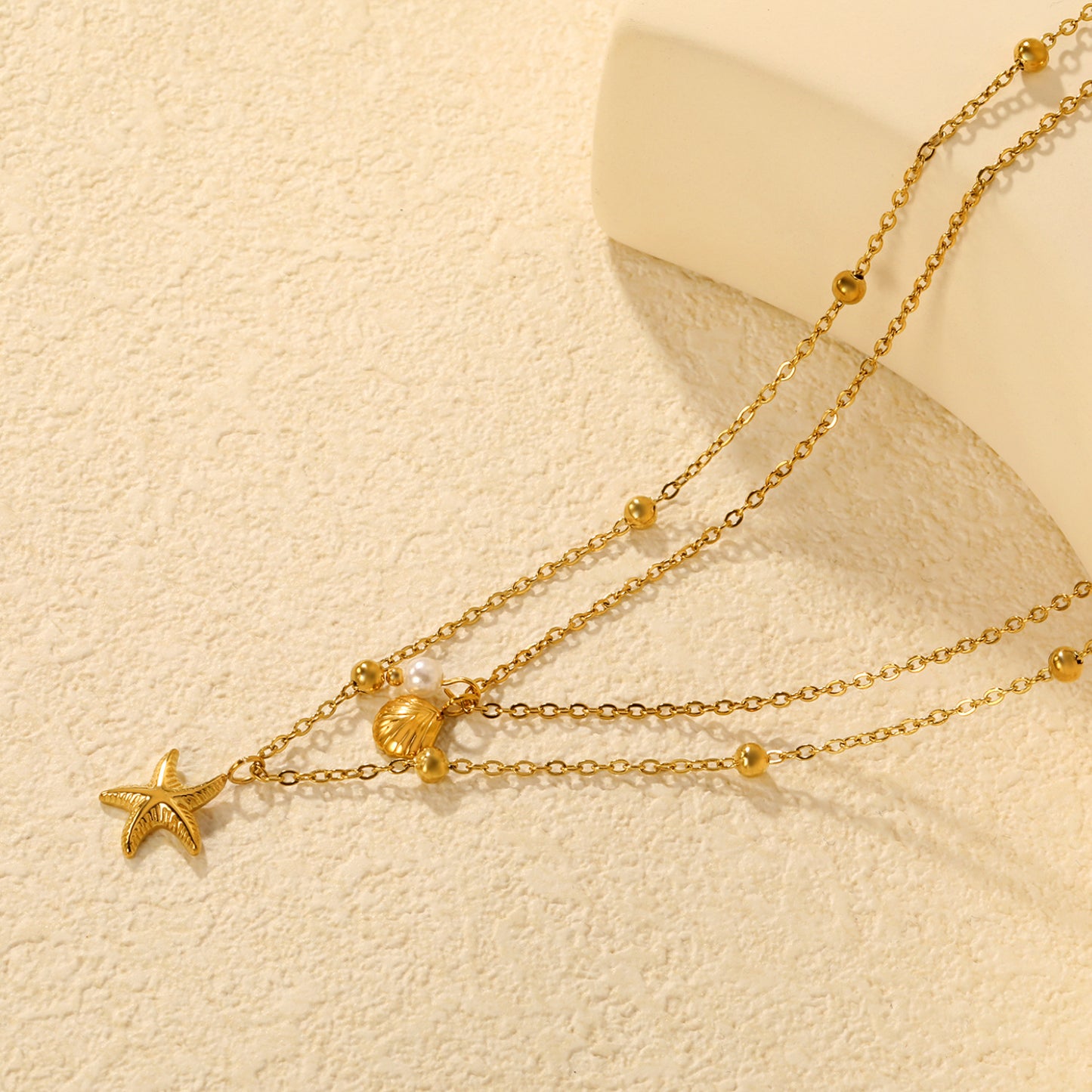 Wholesale Waterproof PVD Gold Pre-Layered Starfish & Disk Necklace