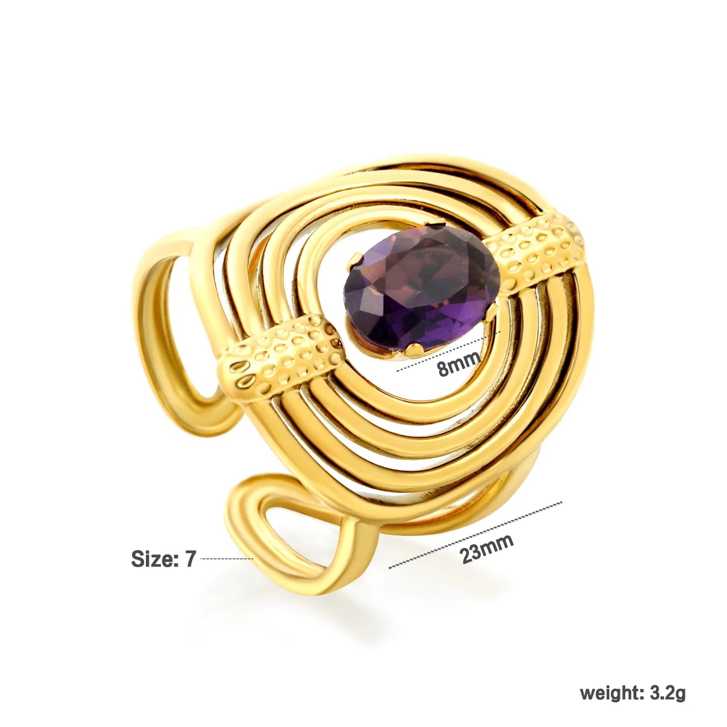 Striking Contrast Between Rough Textured Gold and Smooth Faceted Gemstone