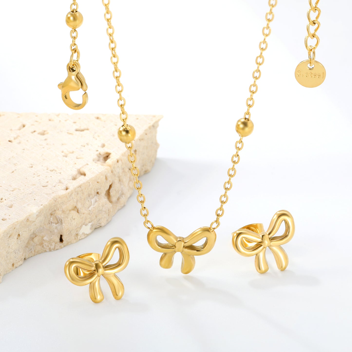 Stainless Steel Gold-Plated Bow Jewelry Set with Round Tag Jewelry Supplier
