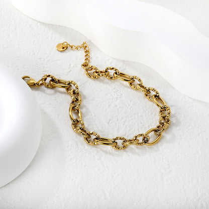 Wholesale Waterproof PVD Gold Sculpted Hollow Motif Oval Link Bracelet