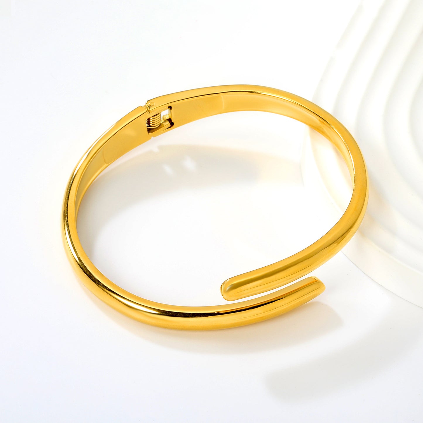 Wholesale 304L Stainless Steel Cross-over Bangle with Spring