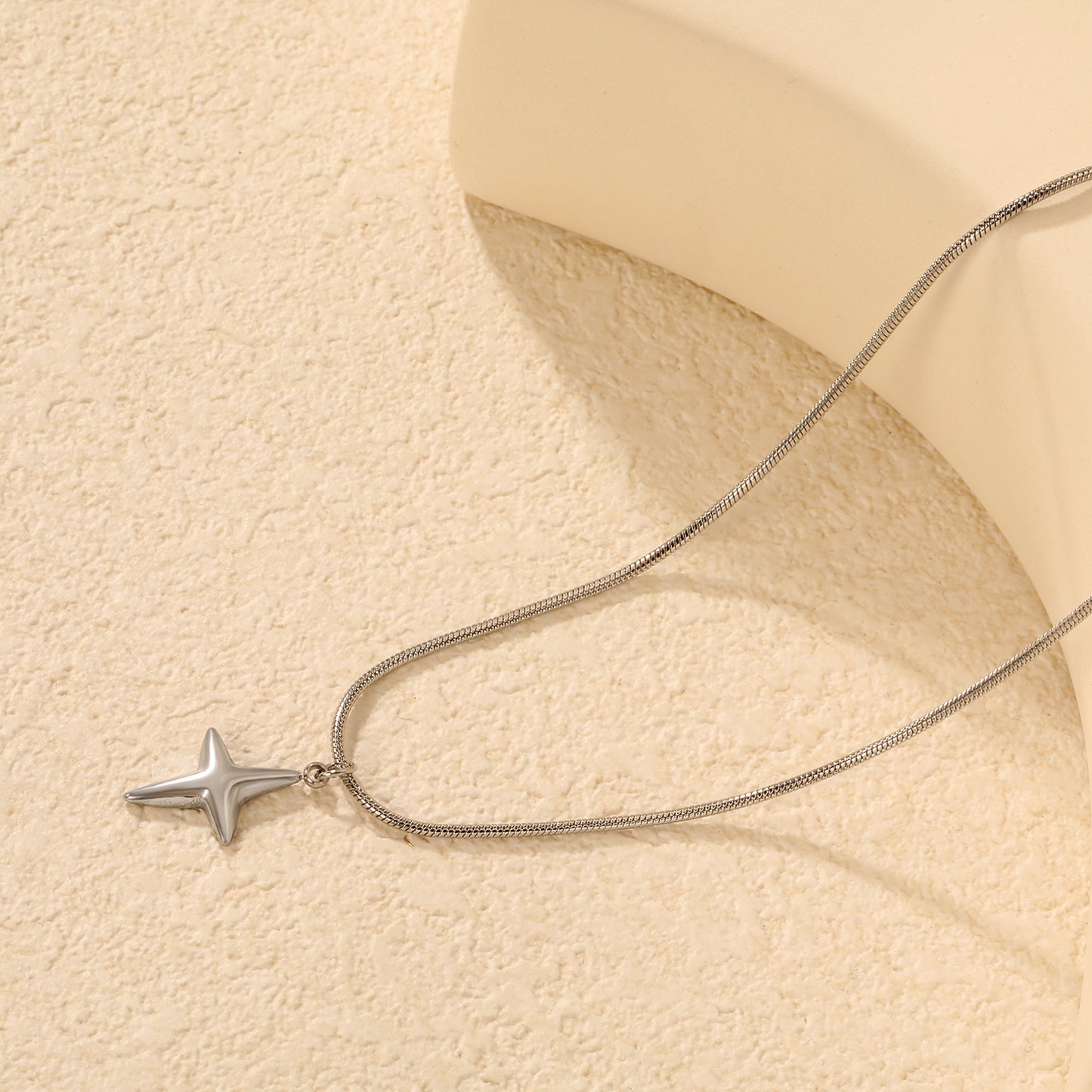 Wholesale Waterproof PVD Silver Sculpted 4-Point Star Snake Chain Necklace