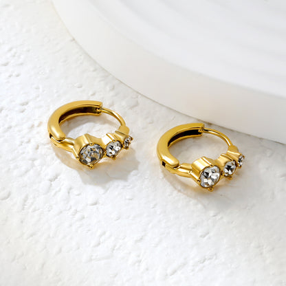 Bulk 18K Gold Plated Asymmetrical Round Zircon Hoop EarringsClose-up of the light-colored ambiance