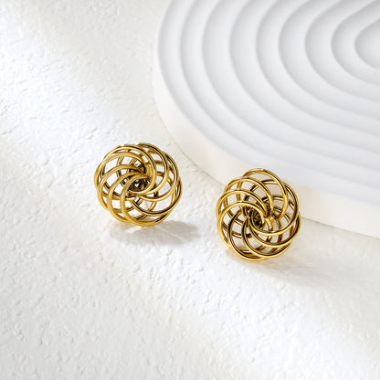 Bulk 18K Gold Plated Botanical Circular Wreath Stud EarringsClose-up of the light-colored ambiance
