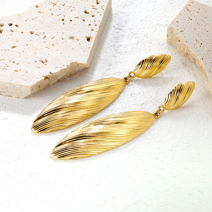 Bulk 18K Gold Plated Botanical Leaf Texture Drop StudsClose-up of the light-colored ambiance