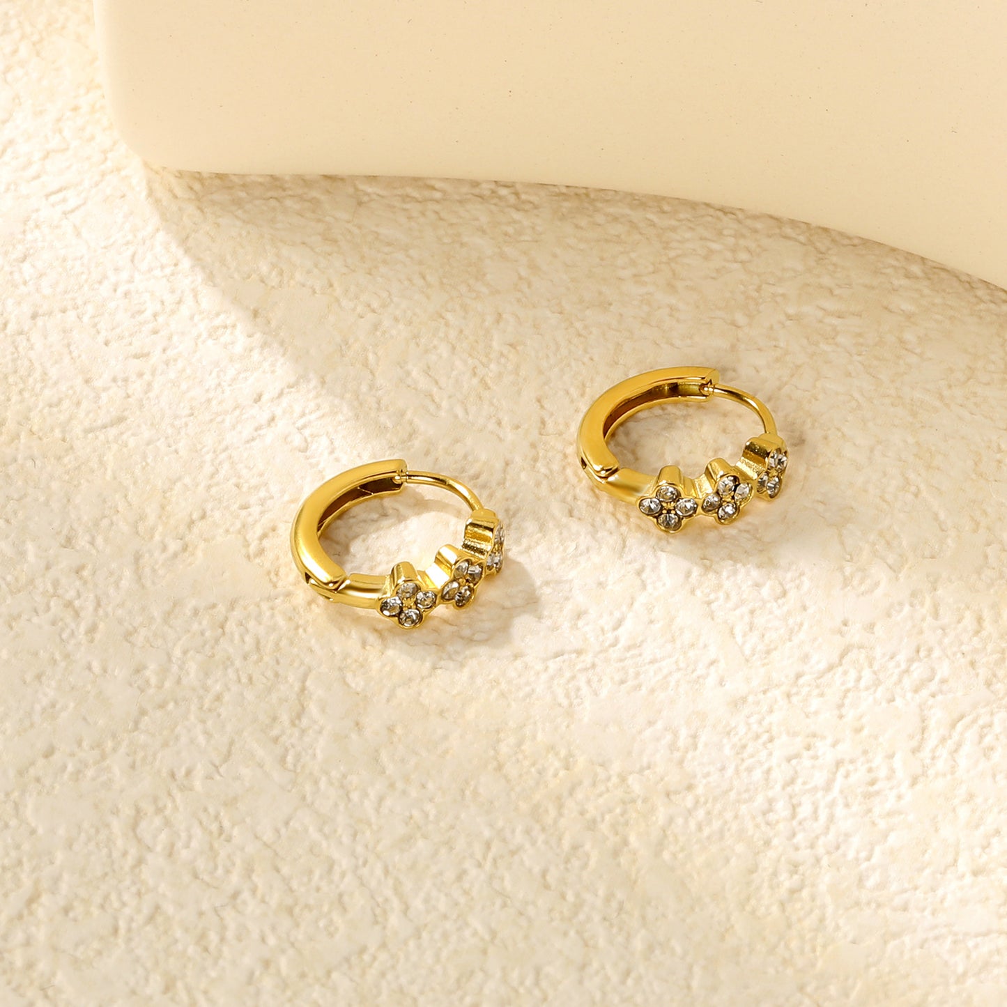 Bulk 18K Gold Plated Botanical Triple Flower CZ Hoop EarringsClose-ups of the gold plating and details