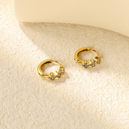 Bulk 18K Gold Plated Botanical Triple Flower CZ Hoop EarringsClose-ups of the gold plating and details