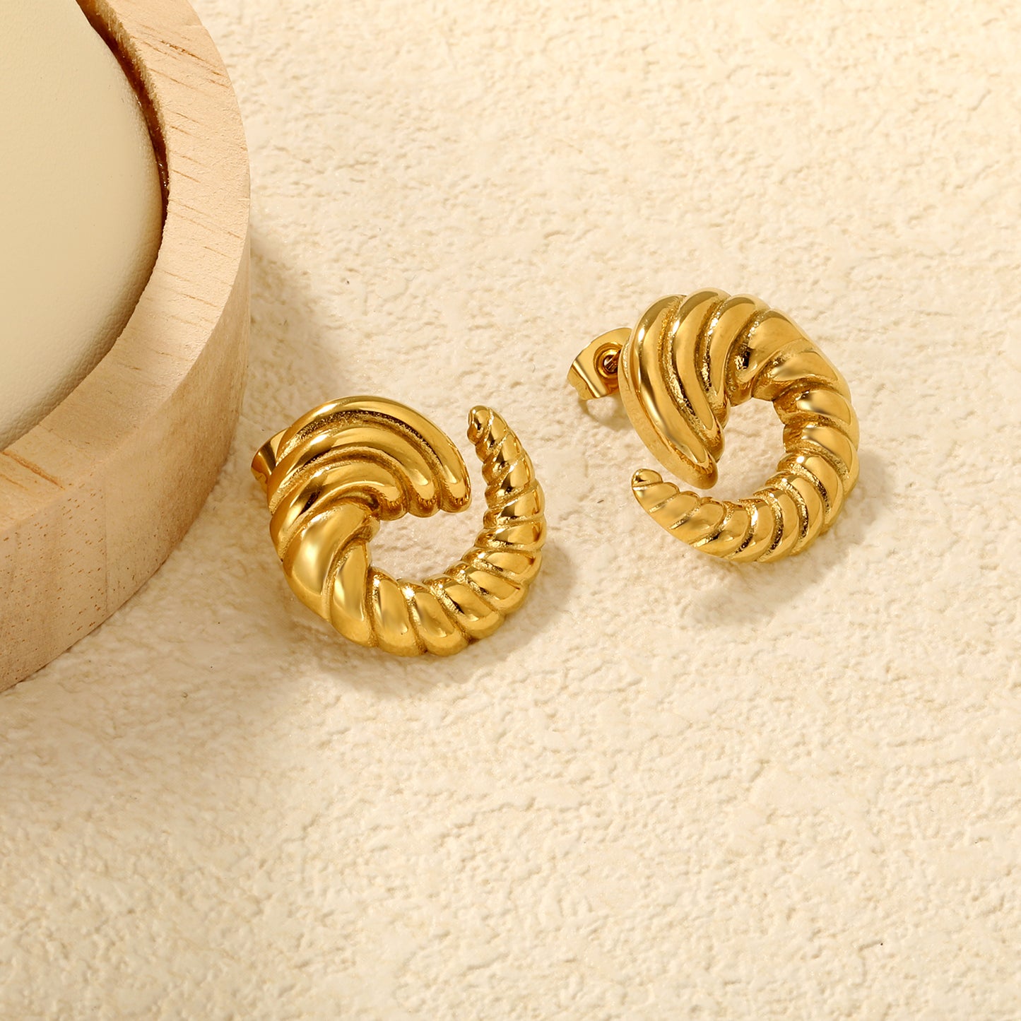 Bulk 18K Gold Plated Celestial Spiral Horn Stud EarringsClose-ups of the gold plating and details