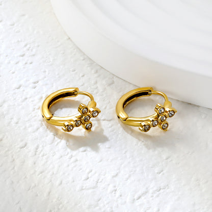 Bulk 18K Gold Plated Classic Cross CZ Hoop EarringsClose-up of the light-colored ambiance
