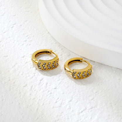 Bulk 18K Gold Plated Geometric Hexagon Crystal Hoop EarringsClose-up of the light-colored ambiance