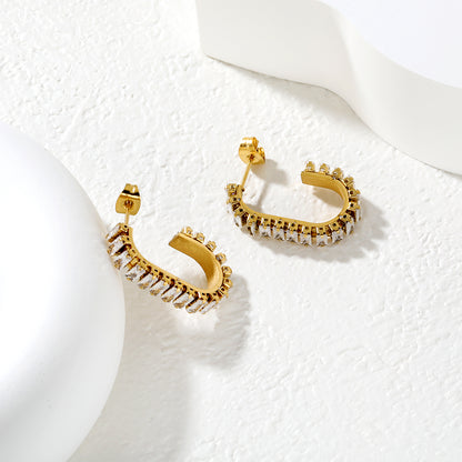 Bulk Waterproof 18K PVD Gold Plated Inside Out Pave C HoopsClose-up of the light-colored ambiance