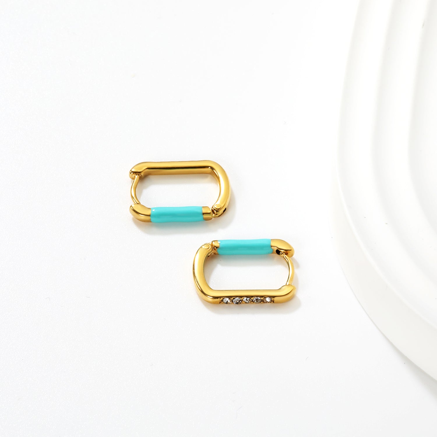 Bulk Waterproof PVD Gold Square Teal Enamel Pave Hoop EarringsClose-up of the light-colored ambiance