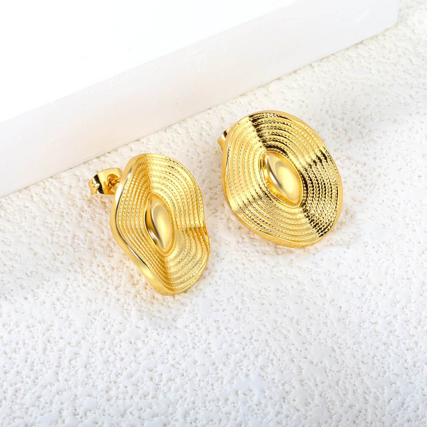 Golden oval wave piece earrings jewelry supplierHigh-resolution Lifestyle Photos