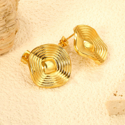 Golden square wavy piece earrings jewelry supplierClose-ups of the gold plating and details