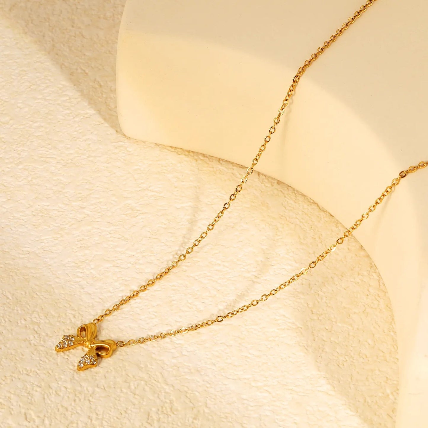Stainless Steel Bow Necklace | Textured Zircon Charm