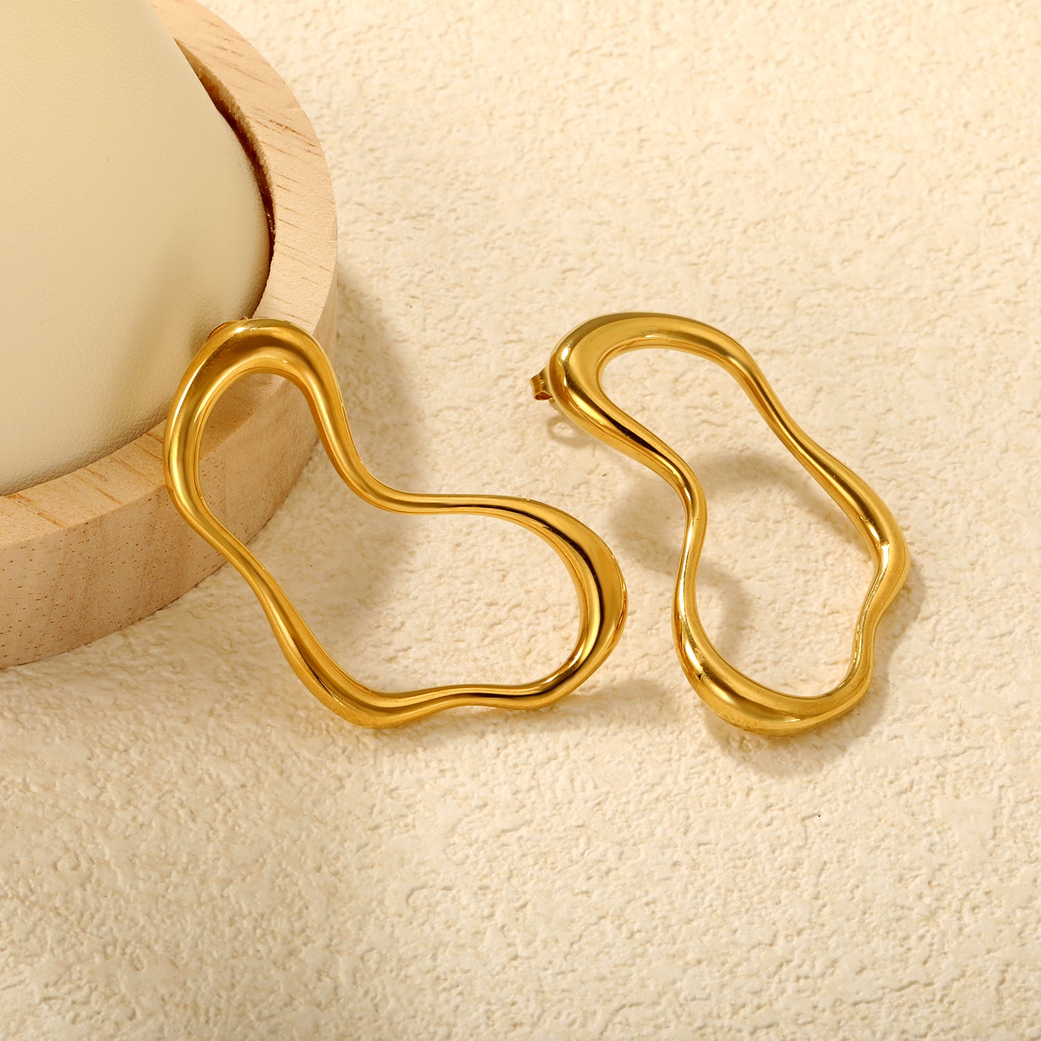 Wholesale 18K Gold Plated Irregular Wave Earrings Futuristic Art MinimalistClose-ups of the gold plating and details