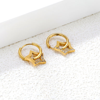 Wholesale 18K Gold Plated Star Drop Earrings Openwork Diamond Accent Celestial LuxuryClose-up of the light-colored ambiance