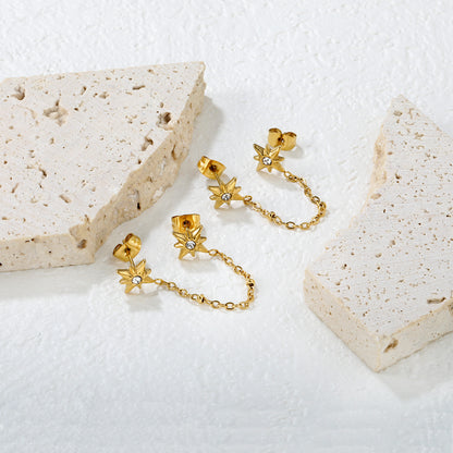 Wholesale 18K Gold Plated Star and Chain Earrays Celestial Theme Festival LuxuryClose-up of the light-colored ambiance