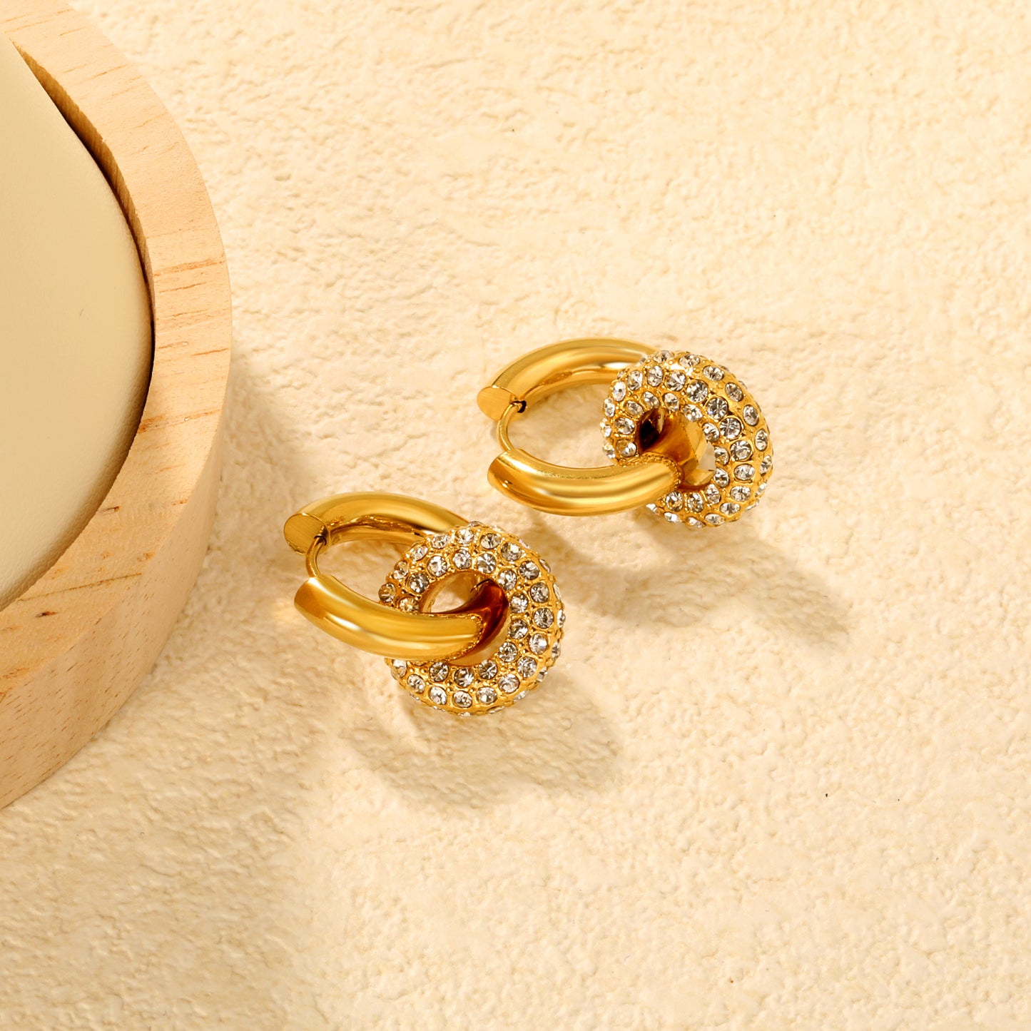 Wholesale Double Interlocking Hoop Earrings PVD Gold Crystal Tarnish FreeClose-ups of the gold plating and details_white