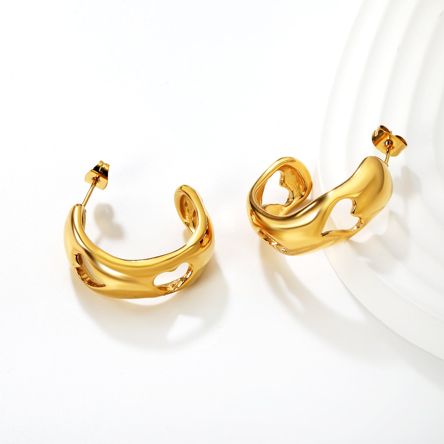 Wholesale Openwork C Hoop Earrings PVD Gold Geometric Design - Jacey JewelryClose-ups of the gold plating and details