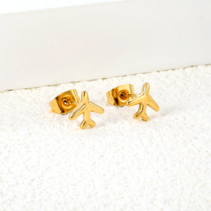 Wholesale Stainless Steel 18K Gold Plated Airplane Plain Pin EarringsClose-up of the light-colored ambiance