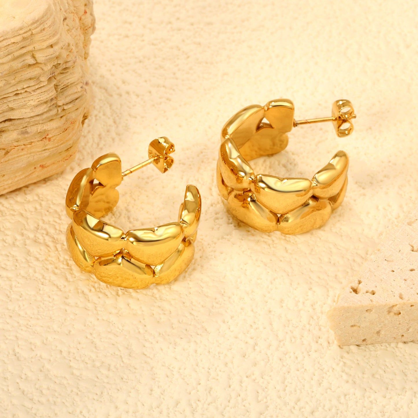 Wholesale Stainless Steel 18K Gold Plated C Shape Connected Heart Stud EarringsClose-ups of the gold plating and details