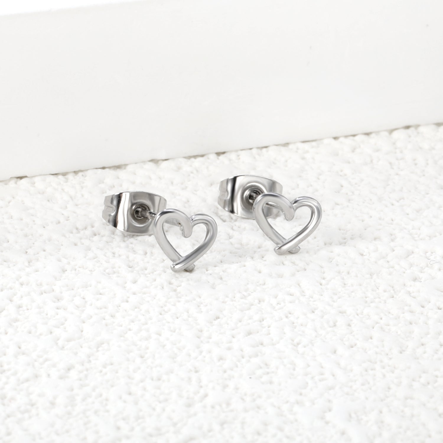 Wholesale Stainless Steel 18K Gold Plated Heart Shape Openwork Plain Pin EarringsHigh-resolution Lifestyle Photos_silver