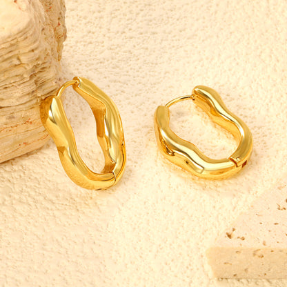 Wholesale Stainless Steel 18K Gold Plated Irregular Solid U Shape Stud EarringsClose-up of the light-colored ambiance