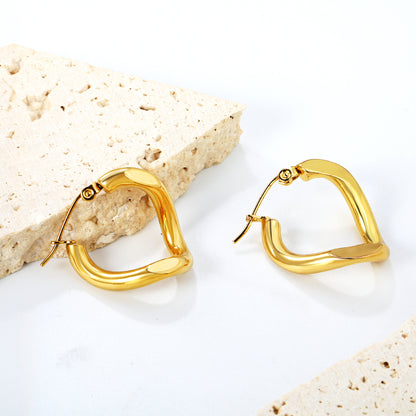 Wholesale Stainless Steel 18K Gold Plated Twisted Thread Reversible Angle Stud EarringsClose-ups of the gold plating and details