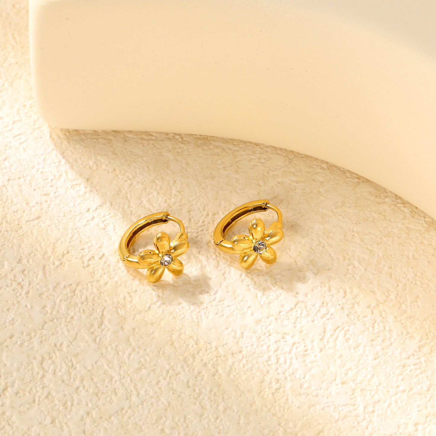 Wholesale Stainless Steel Botanical Flower Zircon Hoop EarringsClose-ups of the gold plating and details