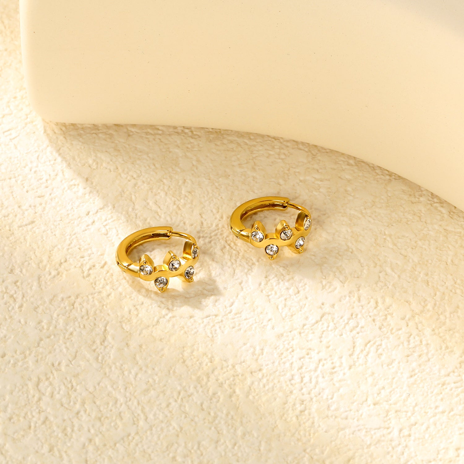 Wholesale Stainless Steel Botanical Vine CZ Hoop EarringsClose-ups of the gold plating and details
