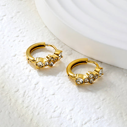 Wholesale Stainless Steel Geometric Six-Piece Round Zircon Hoop EarringsClose-up of the light-colored ambiance
