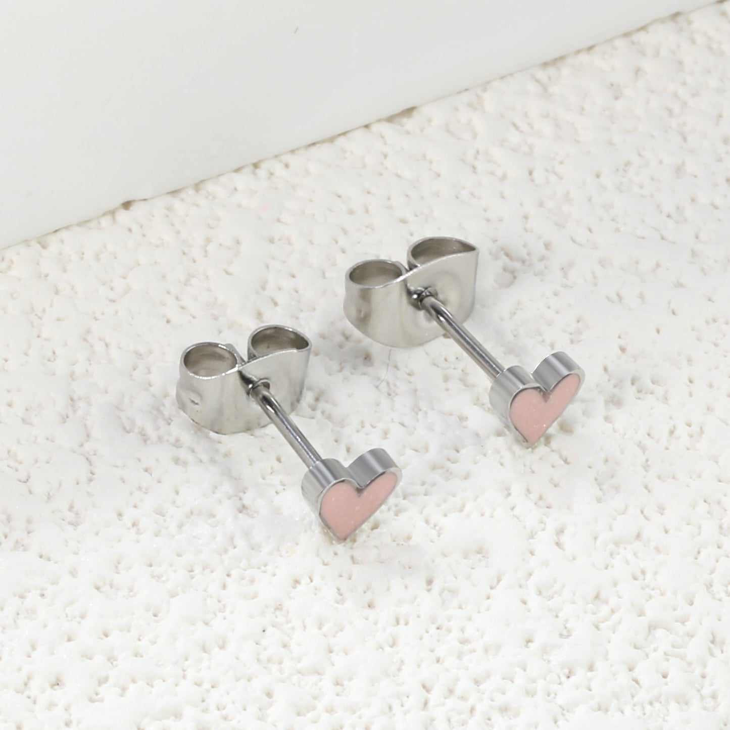 Wholesale Stainless Steel Heart with Pink Glitter Drip EarringsClose-ups of the gold plating and details