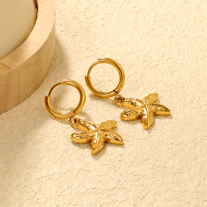 Wholesale Stainless Steel Luxe Large Starfish Charm Hoop EarringsClose-ups of the gold plating and details