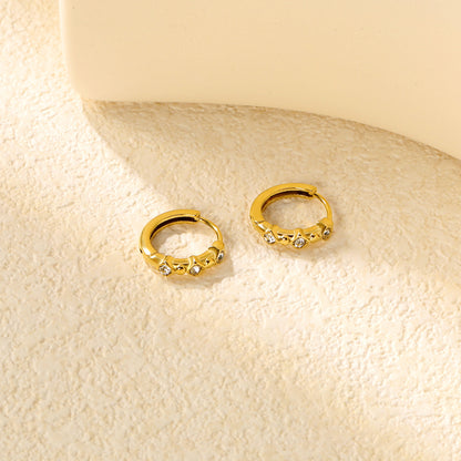 Wholesale Stainless Steel Modern Rhombus and Pearl Hoop EarringsClose-up of the light-colored ambiance