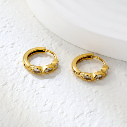 Wholesale Stainless Steel Natural Oval Zircon Hoop EarringsClose-up of the light-colored ambiance