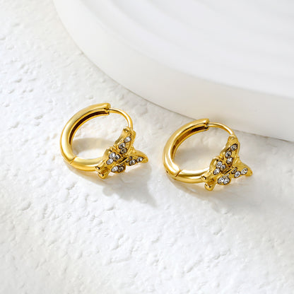 Wholesale Stainless Steel Romantic Butterfly Zircon Hoop EarringsClose-up of the light-colored ambiance
