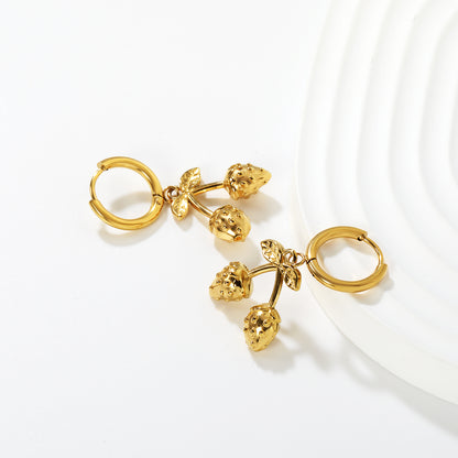 Wholesale Strawberry Earrings 18K Gold Plated Cute Dangle - Jacey JewelryClose-up of the light-colored ambiance